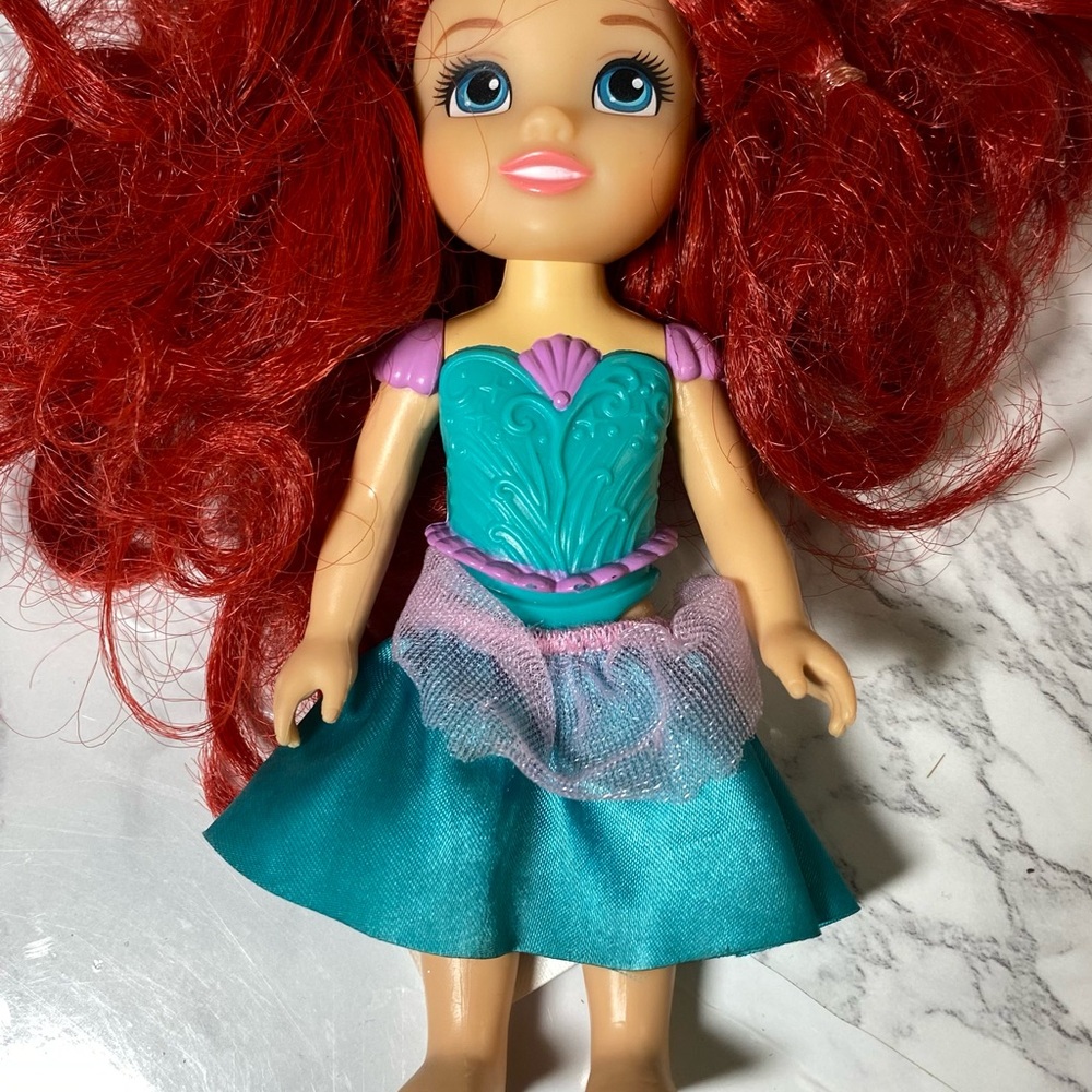 Red and Blue Doll with Accessories